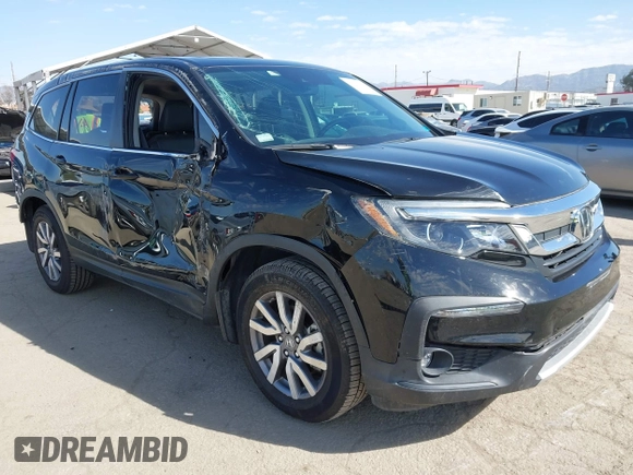 2020 Honda Pilot EX-L with VIN 5FNYF5H54LB009448, listed as a IAAI auction lot 41697106 with 63,310 mi miles. Bid and sale history available at carsss.com. Image 1.