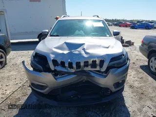 2019 Jeep Cherokee Latitude with VIN 1C4PJLCB3KD206922, listed as a IAAI auction lot 41904629 with 84,665 mi miles. Bid and sale history available at carsss.com. Image 12.