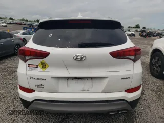 2018 Hyundai Tucson Sport with VIN KM8J33AL6JU735948, listed as a Copart auction lot 56232395 with 126,878 mi miles and Clean title. Bid and sale history available at DreamBid. Image 6.