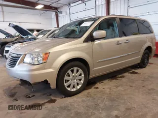 2014 Chrysler Town & Country Touring with VIN 2C4RC1BG2ER422914, listed as a IAAI auction lot 42017742 with 49,856 mi miles and . Bid and sale history available at DreamBid. Image 2.
