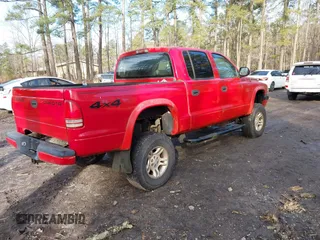 2004 Dodge Dakota Sport with VIN 1D7HG38N64S677103, listed as a IAAI auction lot 41665245 with 212,470 mi miles and . Bid and sale history available at carsss.com. Image 4.