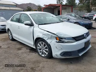 2014 Volkswagen Jetta SE with VIN 3VWD17AJ5EM336243, listed as a IAAI auction lot 42757031 with 99,057 mi miles and . Bid and sale history available at DreamBid. Image 1.