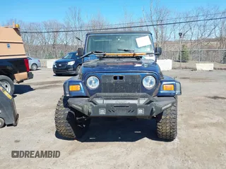 2003 Jeep Wrangler Sport with VIN 1J4FA49S03P343285, listed as a IAAI auction lot 41823684 with 201,723 mi miles and . Bid and sale history available at DreamBid. Image 6.
