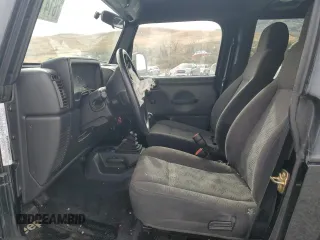 2003 Jeep Wrangler SE with VIN 1J4FA29113P351844, listed as a Copart auction lot 81411324 with 53,525 mi miles and Salvage title. Bid and sale history available at DreamBid. Image 7.