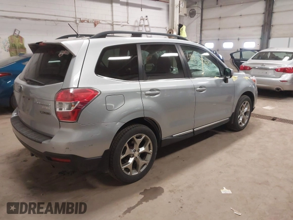 2015 Subaru Forester Touring with VIN JF2SJAWC3FH491026, listed as a IAAI auction lot 41977066 with 179,016 mi miles and . Bid and sale history available at DreamBid. Image 4.