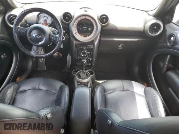 2011 MINI Countryman S with VIN WMWZC5C5XBWL55516, listed as a Copart auction lot 63239235 with 137,545 mi miles and Salvage title. Bid and sale history available at DreamBid. Image 8.