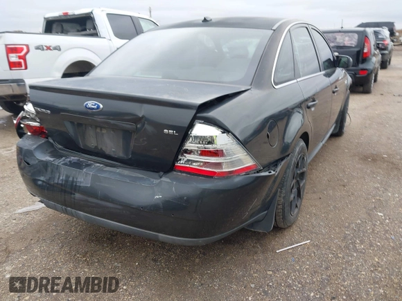 2008 Ford Taurus SEL with VIN 1FAHP24W28G108122, listed as a IAAI auction lot 41546652 with 219,774 mi miles. Bid and sale history available at carsss.com. Image 6.
