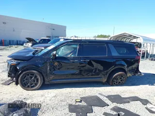 2025 Kia Carnival SX with VIN KNDNE5K35S6472142, listed as a IAAI auction lot 41280650 with 4,181 mi miles and . Bid and sale history available at DreamBid. Image 14.