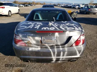 2013 Mercedes-Benz SLK-Class SLK 250 with VIN WDDPK4HA7DF058855, listed as a Copart auction lot 82673374 with 87,699 mi miles and Salvage Title. Bid and sale history available at carsss.com. Image 6.