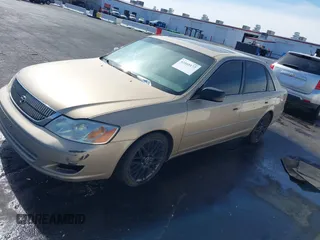 2001 Toyota Avalon XL w/Bucket Seats with VIN 4T1BF28BX1U117793, listed as a IAAI auction lot 42165172 with 247,435 mi miles. Bid and sale history available at carsss.com. Image 12.