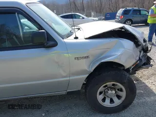 2005 Ford Ranger XL with VIN 1FTZR15E45PA56514, listed as a IAAI auction lot 41794514 with 201,913 mi miles. Bid and sale history available at carsss.com. Image 21.