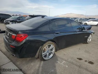 2015 BMW 7 Series 750Li with VIN WBAYE8C59FD781898, listed as a Copart auction lot 48712885 with 0 mi miles and Salvage Title. Bid and sale history available at carsss.com. Image 3.