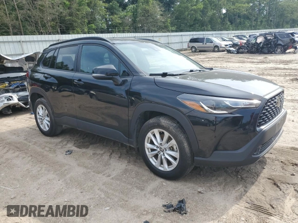2022 Toyota Corolla Cross LE with VIN 7MUCAABG3NV021235, listed as a Copart auction lot 60644285 with 82,403 mi miles and Clean title. Bid and sale history available at DreamBid. Image 4.