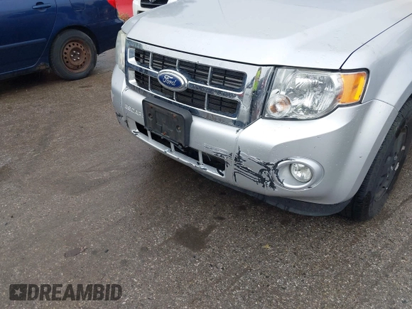 2011 Ford Escape XLT z VIN 1FMCU9DG5BKB13765, wystawiony jako IAAI lot #42458372 z przebiegiem 111 074 mil mil oraz . Historia ofert i sprzedaży dostępna na DreamBid. Obrazek 14.