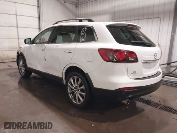 2014 Mazda CX-9 Grand Touring with VIN JM3TB3DA7E0428187, listed as a IAAI auction lot 41247569 with 117,590 mi miles and . Bid and sale history available at DreamBid. Image 3.
