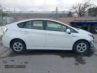 2015 Toyota Prius Four z VIN JTDKN3DU2F1915394, wystawiony jako IAAI lot #41648428 z przebiegiem 153 341 mil mil oraz . Historia ofert i sprzedaży dostępna na DreamBid. Obrazek 14.