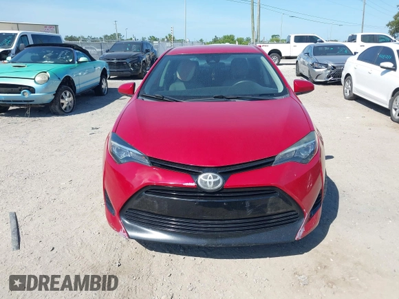 2018 Toyota Corolla L z VIN 2T1BURHE1JC011808, wystawiony jako IAAI lot #42289116 z przebiegiem 124 379 mil mil oraz . Historia ofert i sprzedaży dostępna na DreamBid. Obrazek 12.