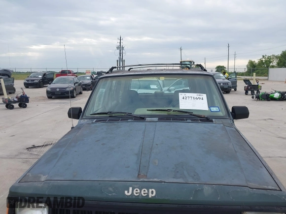 1994 Jeep Cherokee Sport с VIN 1J4FT68S9RL217112, выставлен на аукционе IAAI как лот 42771694 с пробегом 189 770 миль миль и . История ставок и продаж доступна на DreamBid. Изображение 6.