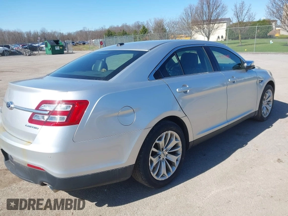 2013 Ford Taurus Limited z VIN 1FAHP2F85DG114828, wystawiony jako IAAI lot #42043885 z przebiegiem 166 786 mil mil oraz . Historia ofert i sprzedaży dostępna na DreamBid. Obrazek 4.