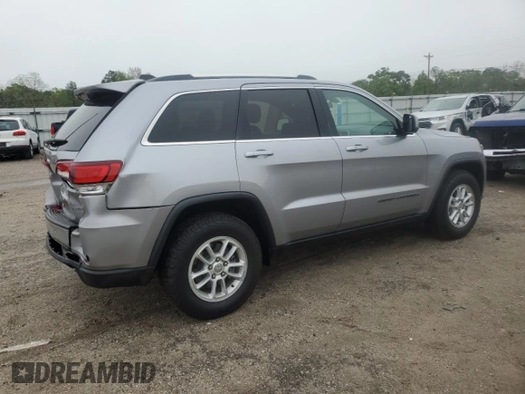 2020 Jeep Grand Cherokee Laredo E with VIN 1C4RJEAG0LC373572, listed as a Copart auction lot 52040195 with 86,604 mi miles and Salvage title. Bid and sale history available at DreamBid. Image 3.