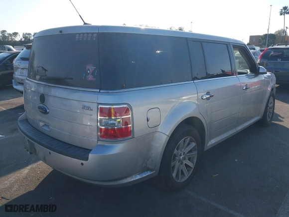 2012 Ford Flex SEL with VIN 2FMGK5CC0CBD01071, listed as a IAAI auction lot 41457425 with 185,413 mi miles. Bid and sale history available at carsss.com. Image 4.