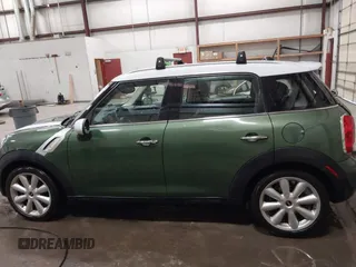 2015 MINI Countryman with VIN WMWZB3C50FWR43714, listed as a IAAI auction lot 41589778 with 93,404 mi miles and . Bid and sale history available at DreamBid. Image 14.