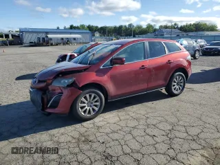 2010 Mazda CX-7 Sport z VIN JM3ER2WM4A0345820, wystawiony jako Copart lot #57170165 z przebiegiem 114 315 mil mil oraz Szkoda całkowita • Salvage title. Historia ofert i sprzedaży dostępna na DreamBid. Obrazek 1.