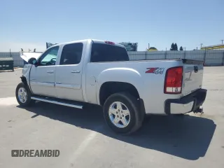2013 GMC Sierra 1500 SLT with VIN 3GTP2WE71DG157541, listed as a Copart auction lot 62363665 with 56,143 mi miles and Salvage title. Bid and sale history available at DreamBid. Image 2.