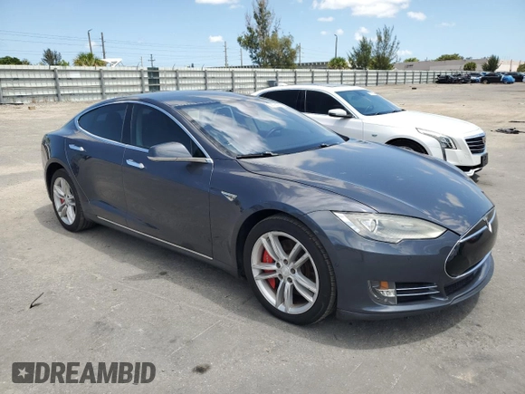 2014 Tesla Model S 60 with VIN 5YJSA1S13EFP63432, listed as a Copart auction lot 56706195 with 114,671 mi miles and Clean Title. Bid and sale history available at DreamBid. Image 4.