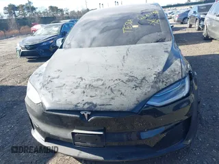 2023 Tesla Model X with VIN 7SAXCAE59PF377408, listed as a IAAI auction lot 41176738 with 32,496 mi miles and . Bid and sale history available at DreamBid. Image 12.