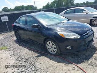 2012 Ford Focus SE with VIN 1FAHP3F21CL390012, listed as a IAAI auction lot 42634521 with 214,617 mi miles and . Bid and sale history available at DreamBid. Image 1.