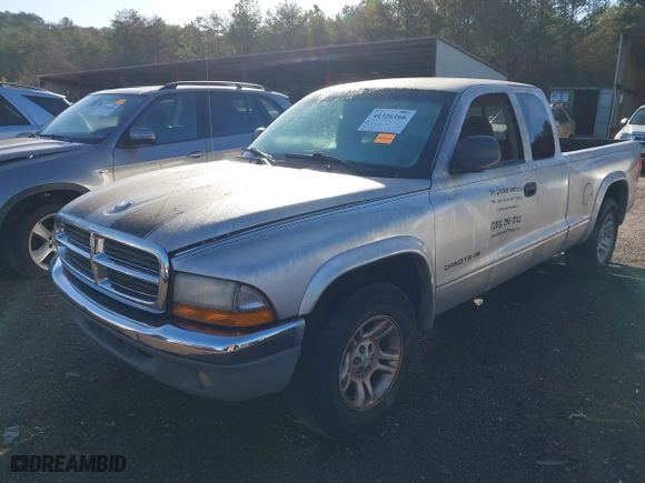 2004 Dodge Dakota SLT with VIN 1D7GL42K94S676958, listed as a IAAI auction lot 41326166 with 176,886 mi miles. Bid and sale history available at carsss.com. Image 2.