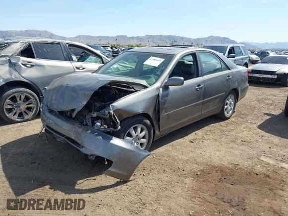 2004 Toyota Camry LE with VIN 4T1BF30K24U569209, listed as a IAAI auction lot 41988665 with 191,017 mi miles. Bid and sale history available at carsss.com. Image 2.