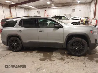 2023 GMC Acadia SLT with VIN 1GKKNULSXPZ263525, listed as a IAAI auction lot 41296040 with 8,631 mi miles and . Bid and sale history available at DreamBid. Image 13.