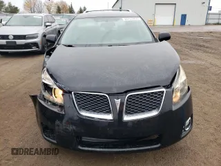 2009 Pontiac Vibe with VIN 5Y2SM67009Z429301, listed as a Copart auction lot 80753404 with 245,490 mi miles and Salvage Title. Bid and sale history available at carsss.com. Image 5.