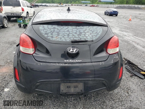 2013 Hyundai Veloster w/Gray Int с VIN KMHTC6AD8DU113990, выставлен на аукционе Copart как лот 54571895 с пробегом 181 757 миль миль и Списание • Salvage title. История ставок и продаж доступна на DreamBid. Изображение 6.