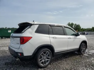 2023 Honda Passport EX-L with VIN 5FNYF8H58PB024039, listed as a Copart auction lot 57269725 with 44,705 mi miles and Salvage title. Bid and sale history available at DreamBid. Image 3.