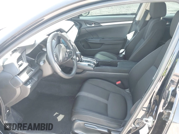 2020 Honda Civic LX with VIN 19XFC2F66LE213975, listed as a IAAI auction lot 42398098 with 69,902 mi miles and . Bid and sale history available at DreamBid. Image 5.