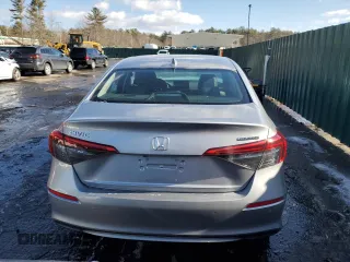 2024 Honda Civic Sedan Touring with VIN 2HGFE1F95RH325566, listed as a Copart auction lot 44560265 with 7,127 mi miles and Salvage Title. Bid and sale history available at carsss.com. Image 6.