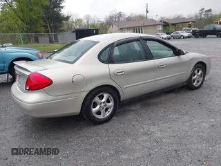 2003 Ford Taurus SES Standard with VIN 1FAFP55U43A140202, listed as a IAAI auction lot 41994960 with 90,650 mi miles. Bid and sale history available at carsss.com. Image 4.