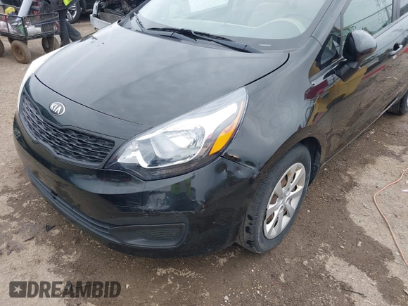 2013 Kia Rio LX with VIN KNADM4A30D6157890, listed as a IAAI auction lot 42066146 with 73,319 mi miles and . Bid and sale history available at DreamBid. Image 6.