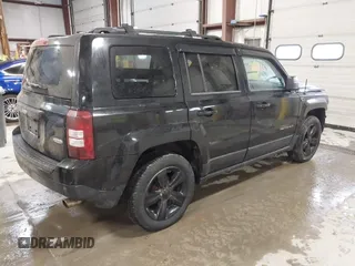 2014 Jeep Patriot Latitude with VIN 1C4NJPFB4ED645447, listed as a IAAI auction lot 41851597 with 128,319 mi miles and . Bid and sale history available at carsss.com. Image 4.