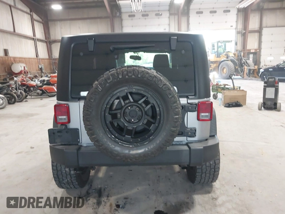 2014 Jeep Wrangler Sport with VIN 1C4AJWAG0EL173362, listed as a IAAI auction lot 42231863 with 99,321 mi miles and . Bid and sale history available at DreamBid. Image 16.