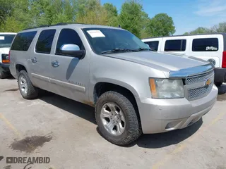 2007 Chevrolet Suburban LT with VIN 3GNFK16367G246091, listed as a IAAI auction lot 42105259 with 216,014 mi miles. Bid and sale history available at carsss.com. Image 1.