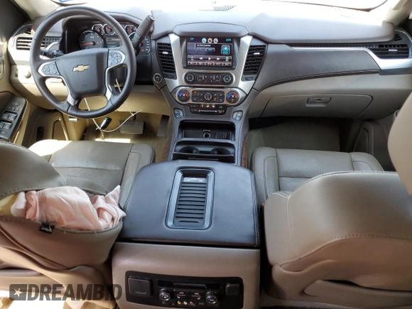 2015 Chevrolet Suburban LTZ with VIN 1GNSKKKC1FR659707, listed as a Copart auction lot 50202895 with 91,680 mi miles and Salvage Title. Bid and sale history available at DreamBid. Image 8.