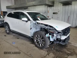 2017 Mazda CX-9 Grand Touring z VIN JM3TCBDY6H0142436, wystawiony jako Copart lot #59614265 z przebiegiem 76 833 mil mil oraz Czysty tytuł • Clean title. Historia ofert i sprzedaży dostępna na DreamBid. Obrazek 4.