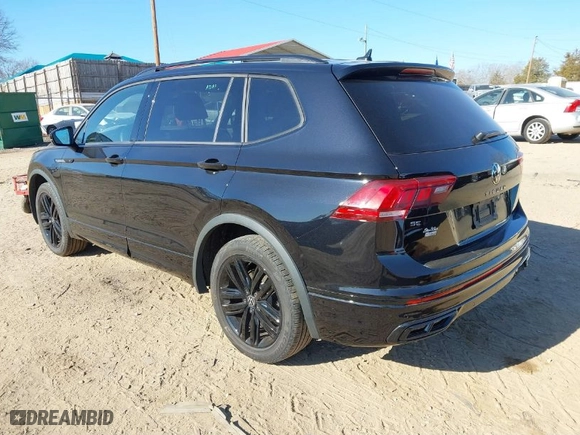 2022 Volkswagen Tiguan SE R-Line Black with VIN 3VVCB7AX1NM084993, listed as a IAAI auction lot 41502738 with 56,559 mi miles. Bid and sale history available at carsss.com. Image 3.