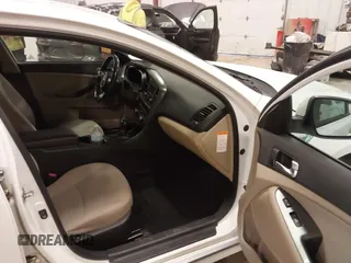 2014 Kia Optima LX with VIN KNAGM4AD2E5076063, listed as a IAAI auction lot 42014109 with 159,450 mi miles and . Bid and sale history available at DreamBid. Image 5.