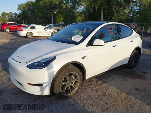 2024 Tesla Model Y Long Range z VIN 7SAYGDEE9RA291266, wystawiony jako IAAI lot #41956682 z przebiegiem 17 066 mil mil oraz . Historia ofert i sprzedaży dostępna na DreamBid. Obrazek 17.