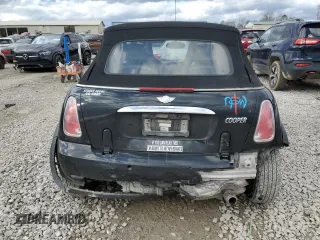 2005 MINI Convertible with VIN WMWRF33485TG11549, listed as a Copart auction lot 87285984 with 58,934 mi miles and Salvage title. Bid and sale history available at DreamBid. Image 6.